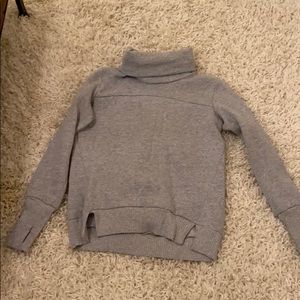 A gray turtleneck sweatshirt